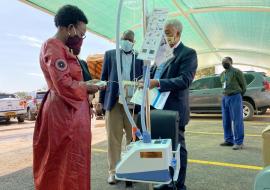 Members of the Health leadership in Uganda assess medical equipment