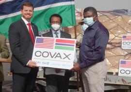 The Deputy Chief of Mission at the United States Embassy in the Gambia, Mr Jason Willis official handing over the vaccines to the Hon. Minister for Health, Dr. Ahmadou Lamin Samateh