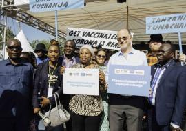 Ted Chaiban with the Minister for Health and WHO Country Representative at the Trade Fair in Dar es Salaam