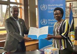 WHO Representative to Uganda, Dr Yonas Tegegn Woldemariam handing over 2400 monkeypox tests to the Minister of Health Hon Dr Jane Ruth Aceng Acero.