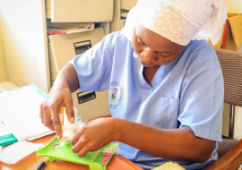 A Mental health nurse prescribing drug to a patient at PHC Mala-Kachallah during the consultation. Photo credit: Kingsley Igwebuike/WHO