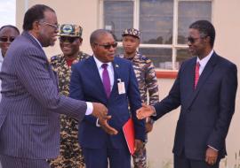 His Excellency, Dr Hage Geingob, President of the Republic of Namibia greeting WHO Representative, Dr Charles Sagoe-Moses during a visit to the Hosea Kutako International Airport in 2020 as part of government preparedness efforts.