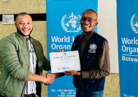 Dr Theo Ntenegi WHO Botswana Case Management Officer presenting an award of completion to a Basic Emergency Care graduate following the Greater Gaborone district training in May 2023 