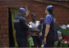 WHO staff engaging with the community WHO staff engaging with the community