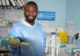 A laboratory Scientist prepares samples for genome sequencing