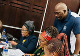 WHO South Africa Staff facilitating group working during the micro plan development session. This session involved prioritization of subdistricts based on access and utilization data  