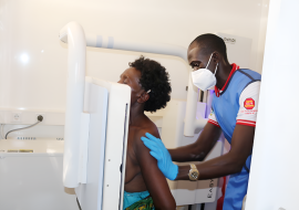 A woman undergoing screening for Tuberculosis at Namugongo, Wakiso district..