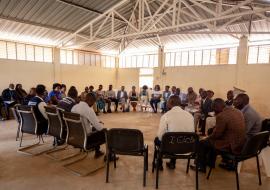 WHO representative leads community focus group WHO representative leads community focus group