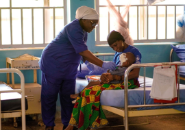 A nurse dressing the sore on the face of a patient suffering from Noma (photo credit Ogbeide E) A nurse dressing the sore on the face of a patient suffering from Noma (photo credit Ogbeide