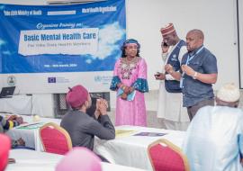 The WHO Officer-in-Charge (Dr. Pekezou Aurelien) and Interim Emergency Manager NEN (Dr. Kumshida Balami) encourage the participants during the mental health training. ©Kingsley Igwebuike/WHO