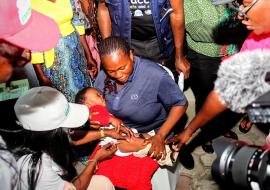 A child being vaccinated in Yenagoa during the Malaria vaccine Roll out A child being vaccinated in Yenagoa during the Malaria vaccine Roll out