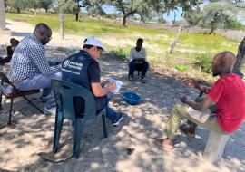WHO experts engaging with the community on the ground