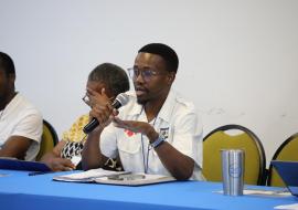 A participant engaging in discussion during the event