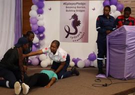 Lesotho’s paramedic team demonstrates how to administer first aid to a patient with leprosy during the commemoration of World Epilepsy Day.