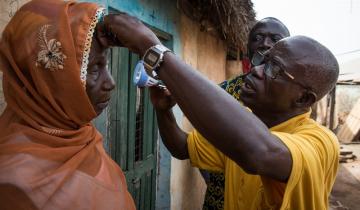 Fusi, an Opthalmic nurse screens communities in Yendi  Photo: Ruth McDowall/Sightsavers 2016