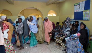 Women with eligible children queue up for routine immunization at health facility in Kaduna.