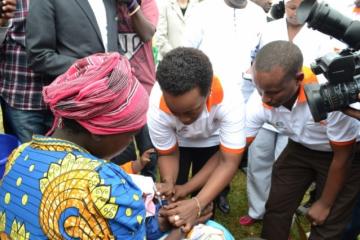 The Minister of Gender and Family Promotion, Dr Diane Gashumba, vaccinating against pneumonia at the launching of MCH week