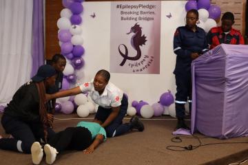 Lesotho’s paramedic team demonstrates how to administer first aid to a patient with leprosy during the commemoration of World Epilepsy Day.