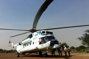 In Mingkaman, the “EWARS in a box” kits arrive by UN helicopter. Due to poor road conditions access to more remote areas or those in conflict is only possible by air, especially during the rainy season