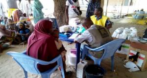 IRC Health officer been assisted by a community volunteer at Goni Kachallari community where Integrated PHC services are provided IRC