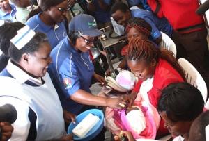 Zambia’s First Lady, Mrs Esther Lungu administers oral polio vaccine to a baby at the AVW regional launch in Lusaka