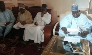 Adamawa State Deputy Governor reading the TOR at the inaugural meeting of the TFI