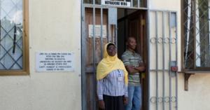 Dr Pilly Sahid and Yusuf Ahmed Mzitto, known as "Kessy", at the Mwananyamala District Hospital’s methadone clinic in Dar es Salaam.