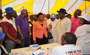 The Minister of Health accompanied by the wife of executive governor of Rivers state and chairperson of NIFAA during inspection of an RDT exhibition stand