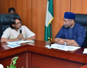 Dr Moeti speaking with Nigeria's Minister for Budget & Planning