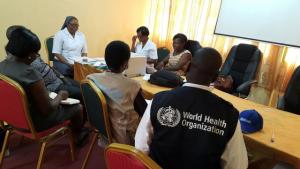 A team from WHO meet with senior staff of Jirapa hospital in Upper West Region during a mission to assess the status of meningitis preparedness and response activities