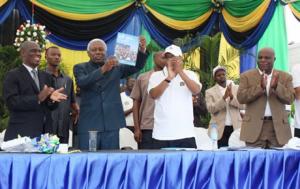 The Vice President holding the report launched during WMD 2012. Hon Minister at extreme left and WR at extreme right