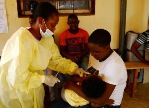 Child receiving measles vaccine