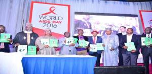 From R-L, Barr Adebayo Shittu; Minister for Communication, Dr Osagie Enahire, Minister of State for Health, Minister for Health, representative of the PLHIV, Dr Sani Aliyu; DG NACA and other dignitaries at the event