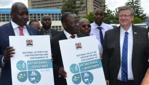   Launching of the National Action Plan for Prevention and Containment of  AMR by Cabinet Secretary Dr  Cleopa Mailu. Looking on, WR Kenya Dr Rudi Eggers, PS Livestock Dept Dr  Andrew Tuimur and members of the AMR team in Kenya  