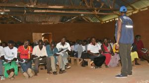 Ms. Nanyonga training the VHTs at Ngenge sub-county in community mobilization 