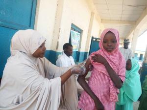 Picture showing a girl being vaccinated for yellow fever during the reactive vaccination campaign in Zamfara State, Nigeria