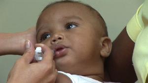 A child being vaccinated against rotavirus