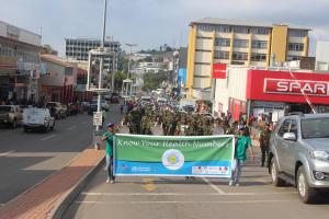 Community members marching through the streets of Mbabane