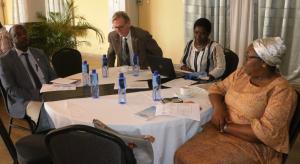 (L-R) Dr. Alex Gasasira (WHO), Dr. Charles W. Oliver (USAID), Mrs. Ellen Munemo (ACCEL) and Assistant Health Minister Dr. Catherine cooper at the validation workshop