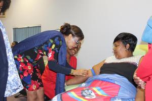 The Honourable Minister of Health, Senator Sibongile Ndlela Simelane donating blood with assisted by from the WHO Country Representative, Dr Tigest Ketsela Mengestu