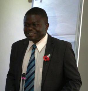 Honorable Minister of Health Dr Peter Kumpalume, MP speaking to participants at the opening ceremony of the TOT cervical cancer capacity building workshop