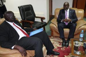 Dr Olu presenting his letter of credentials to Honorable Deng Dau Deng Malek. Photo: WHO