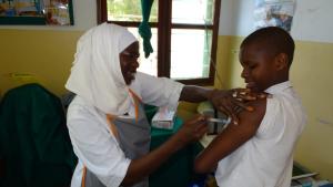 Grace receiving her second dose of HPV vaccine