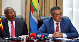 Prime Minister Dr Ruhakana Ruganda (left) and WHO DG Dr Tedros Adhanon Ghebreyesus address the media during the presser