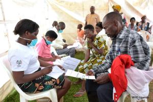 Healh workers receive members of the public for TB screening during the commemoration 