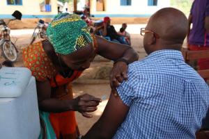 A resident of Sakure Payam being vaccinated against YF