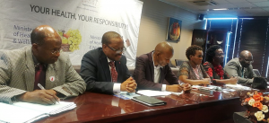 The Permanent Secretary of the MoHW, Ms R Maphorisa (third from the right), Ministry management team and the NVC Chairperson Dr Matshaba (2nd from the left) during the debriefing session
