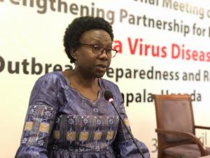 Minister of Health, Dr Jane Ruth Aceng addresses the congregation during the International Partners meeting to Discuss Ebola Preparedness and Response