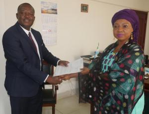 Mr Evans Liyosi, new WHO Representative in Sierra Leone presenting his credentials to Hon Nimatulai Bah Chang, Acting Minister of Foreign Affairs and International Cooperation