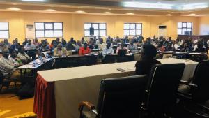      The Minister of Health Dr Jane Ruth Aceng addressing health workers at the orientation meeting